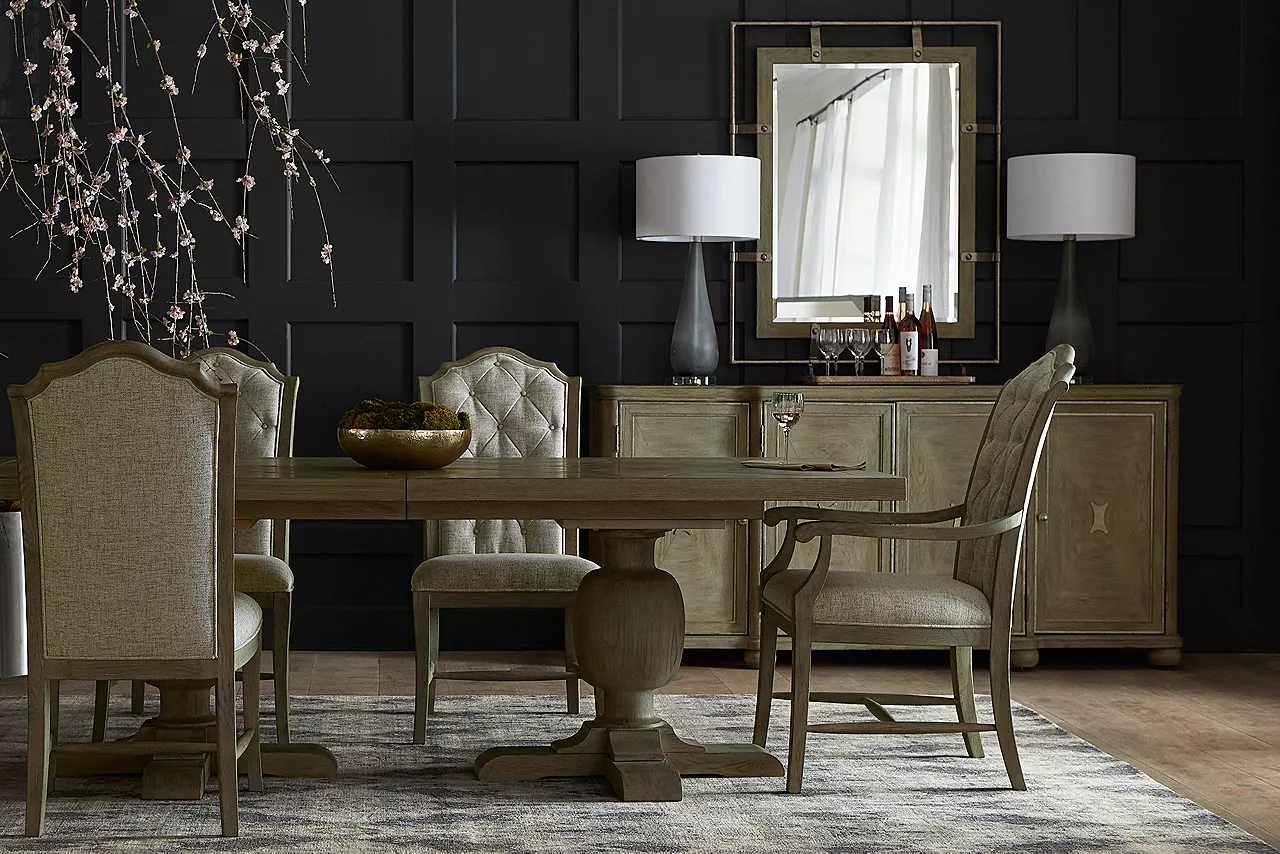 Candler Park Dining Table, Buffet, Upholstered Dining Chairs, and Upholstered Armchairs in Burnished Grey in a room scene.
